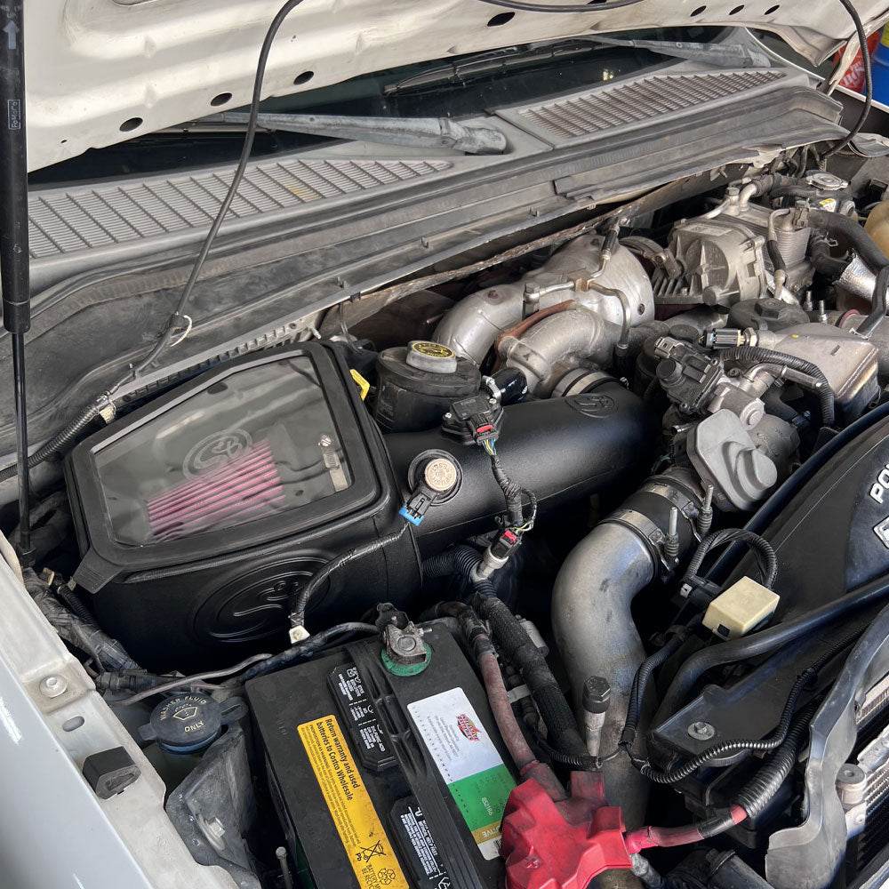 Cold Air Intake for 2008-2010 Ford Powerstroke 6.4L - S&B installed in the engine compartment of a vehicle.
