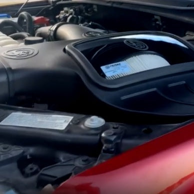 Cold Air Intake for 2018-2021 Ford F-150 Powerstroke 3.0L installed in the engine compartment of a vehicle
