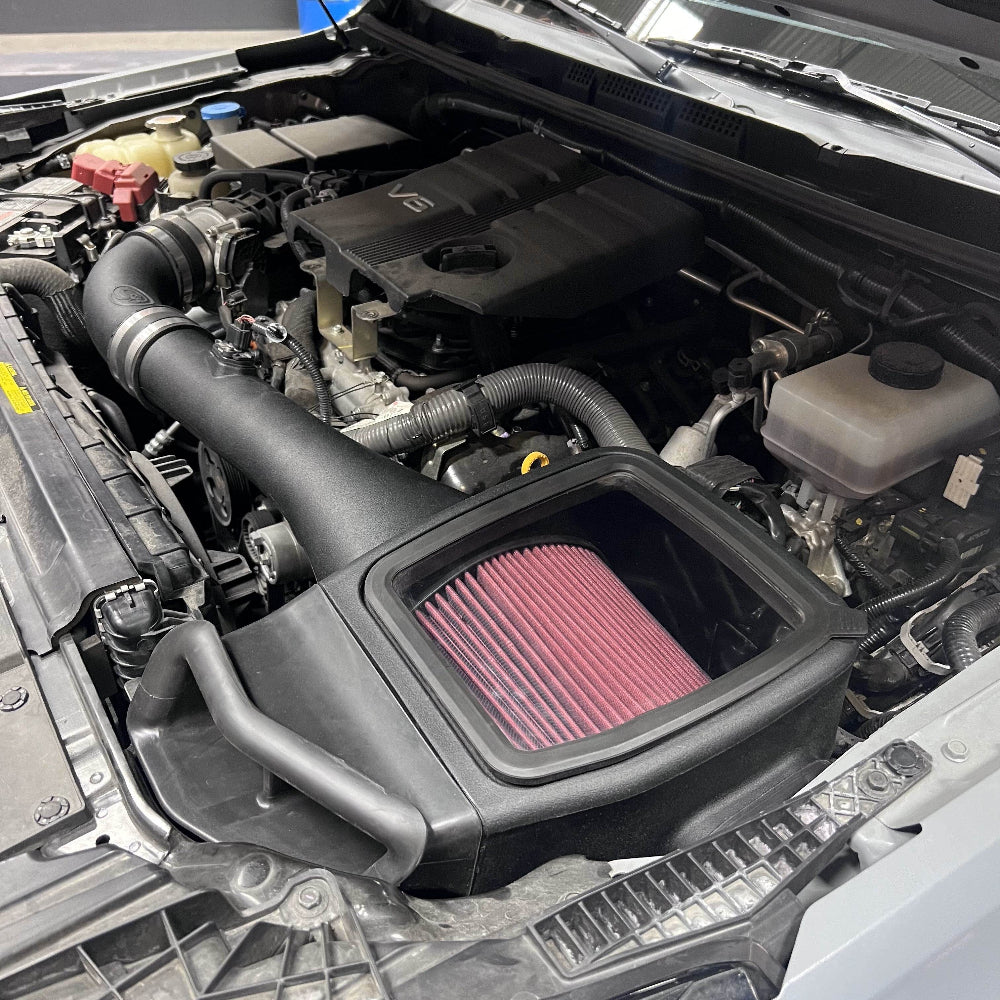 Cold Air Intake For 2005-2019 Nissan Frontier, 2005-2012 Pathfinder, 2005-2015 Xterra 4.0L - S&B installed in the engine compartment of a vehicle
