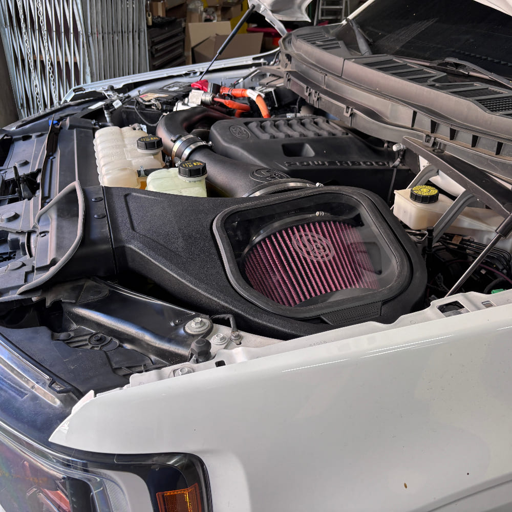 Cold Air Intake For 2021-2025 Ford F-150 3.5L PowerBoost installed in the engine compartment of a vehicle

