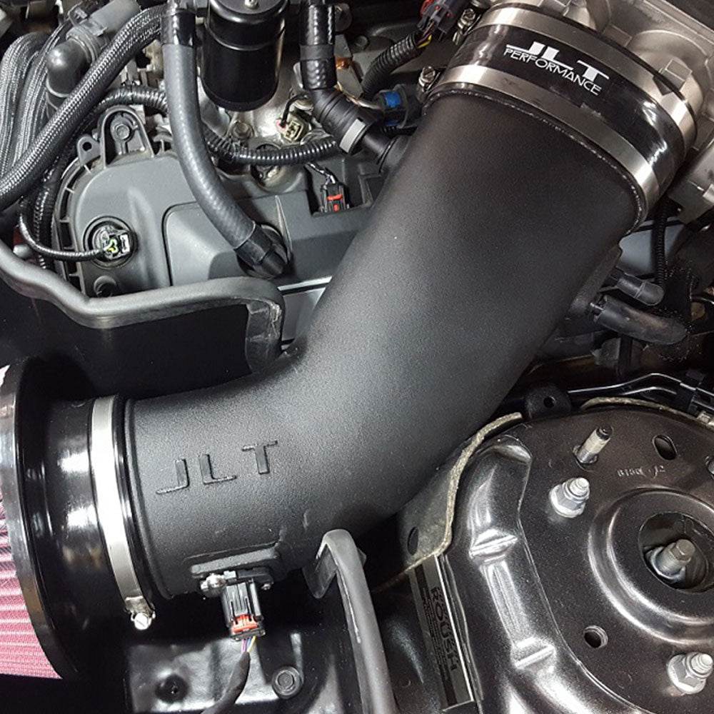 Close-Up JLT Cold Air Intake for 2015-2017 Ford Mustang GT Roush / VMP Supercharged 5.0 - S&B installed in the engine compartment of a vehicle
