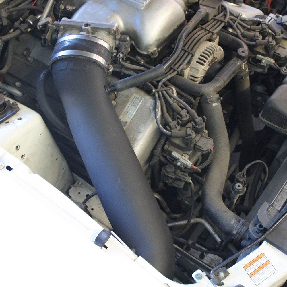 JLT Cold Air Intake for 1996-1998 SVT Cobra - S&B installed in the engine compartment of a vehicle
