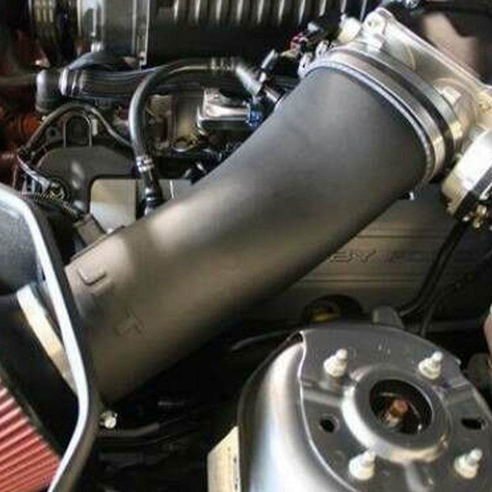 Close-Up JLT Big Air Intake for 2011-2014 GT with Roush/Whipple/FRPP S/C - S&B installed in the engine compartment of a vehicle
