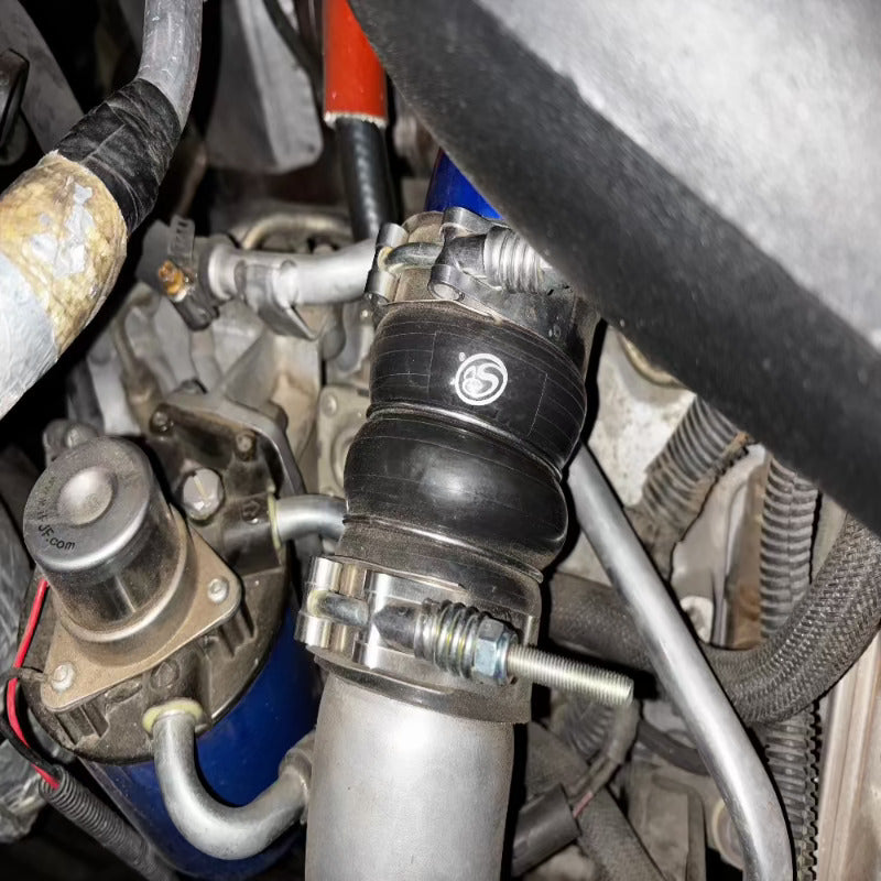 Close-up of an SB Filters Hot and Cold Side Boot Kit For 2004.5-2005 Chevy / GMC Duramax 6.6L (LLY) installed in a car