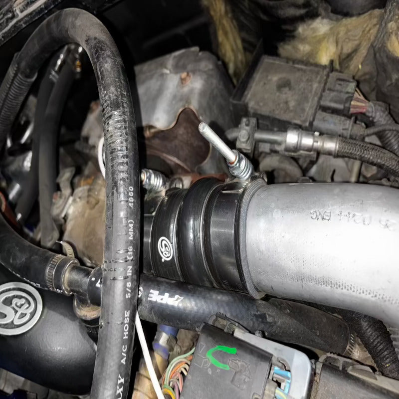 Close-up of an SB Filters Hot and Cold Side Boot Kit For 2004.5-2005 Chevy / GMC Duramax 6.6L (LLY) installed in a car
