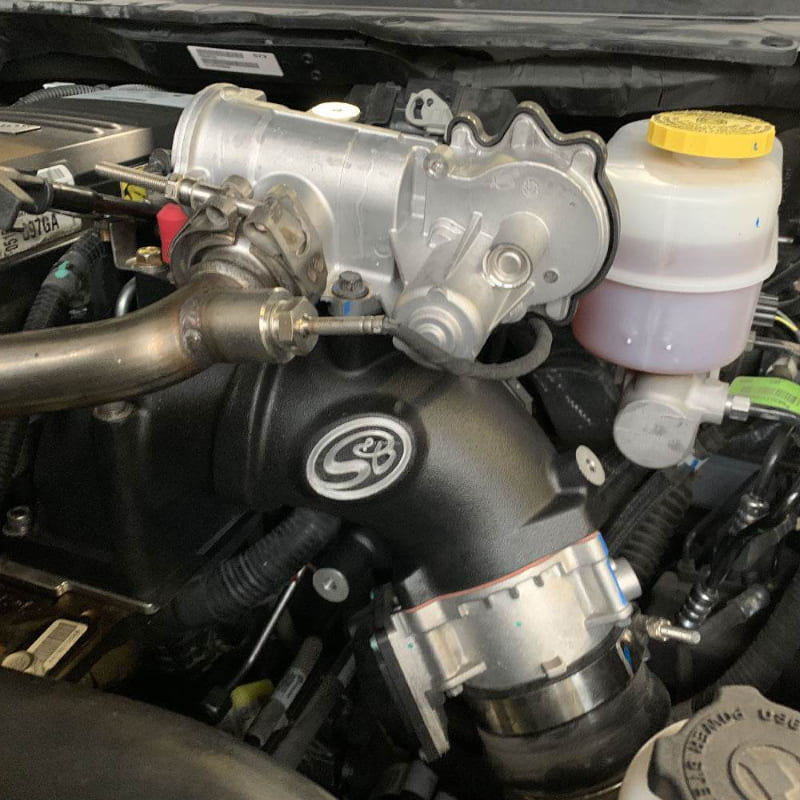 Close-up of an SB Filters Intake Elbow For 2007.5-2018 Dodge Ram 2500, 3500 6.7L Cummins 