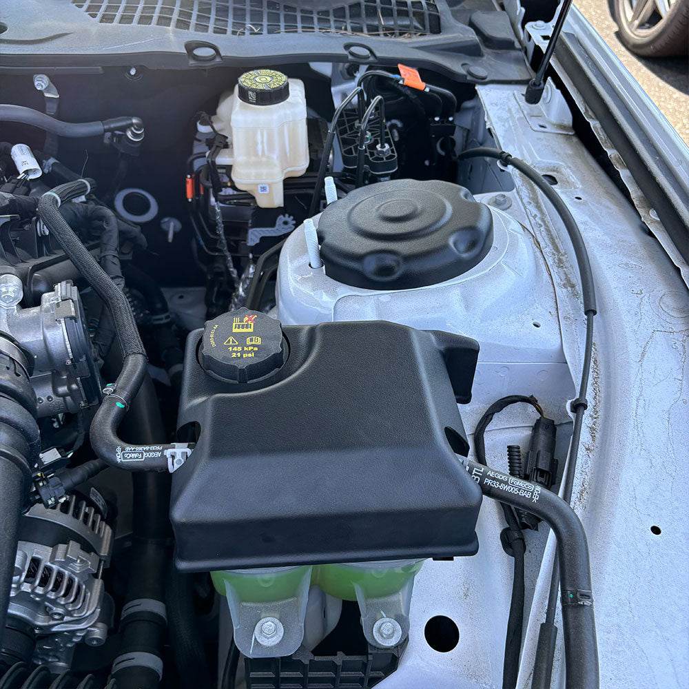 JLT Coolant Tank Cover For 2024-2025 Ford Mustang GT, Ecoboost - S&B  installed in the engine compartment of a vehicle.