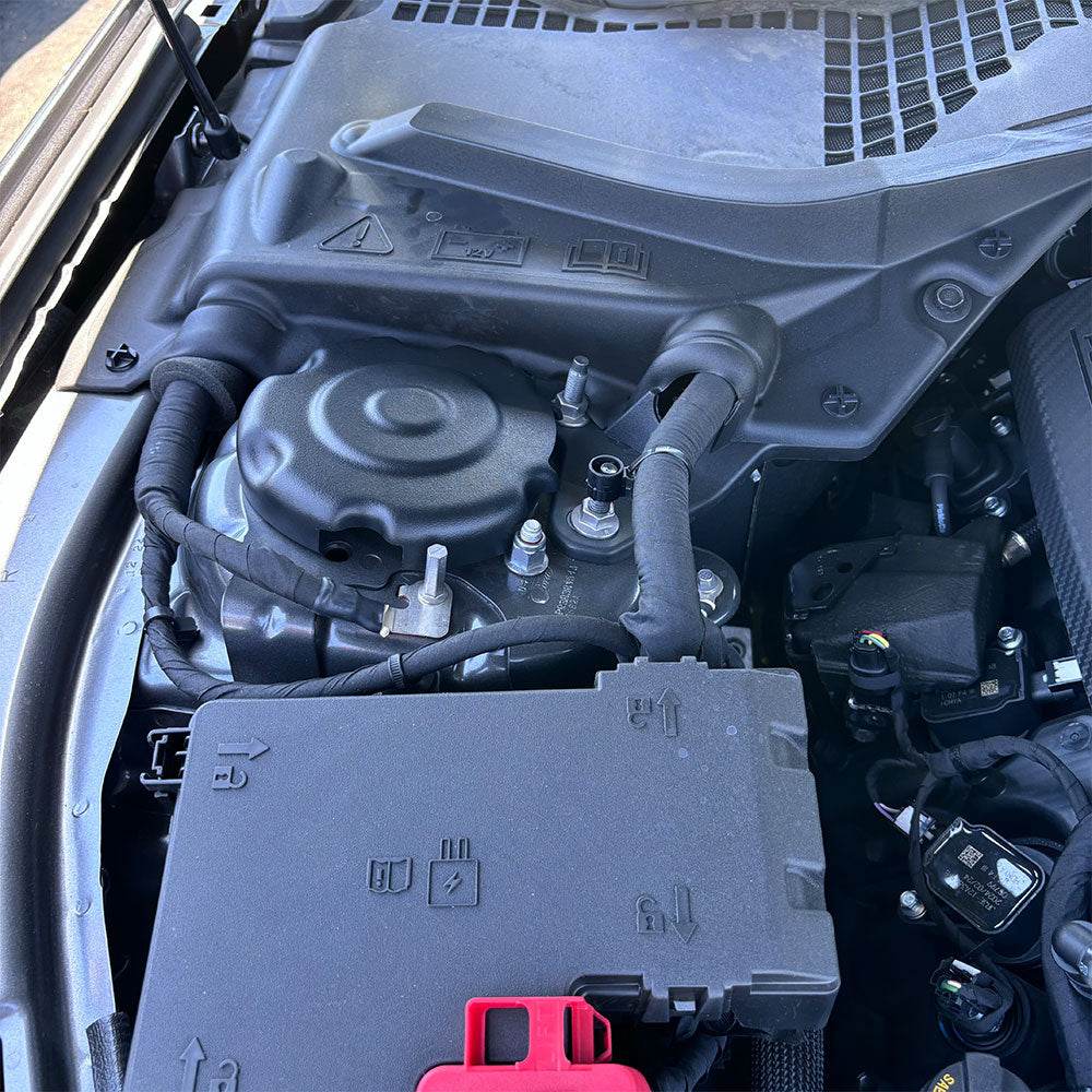 JLT Strut Covers For 2024-2025 Mustang - S&B installed in the engine compartment of a vehicle.