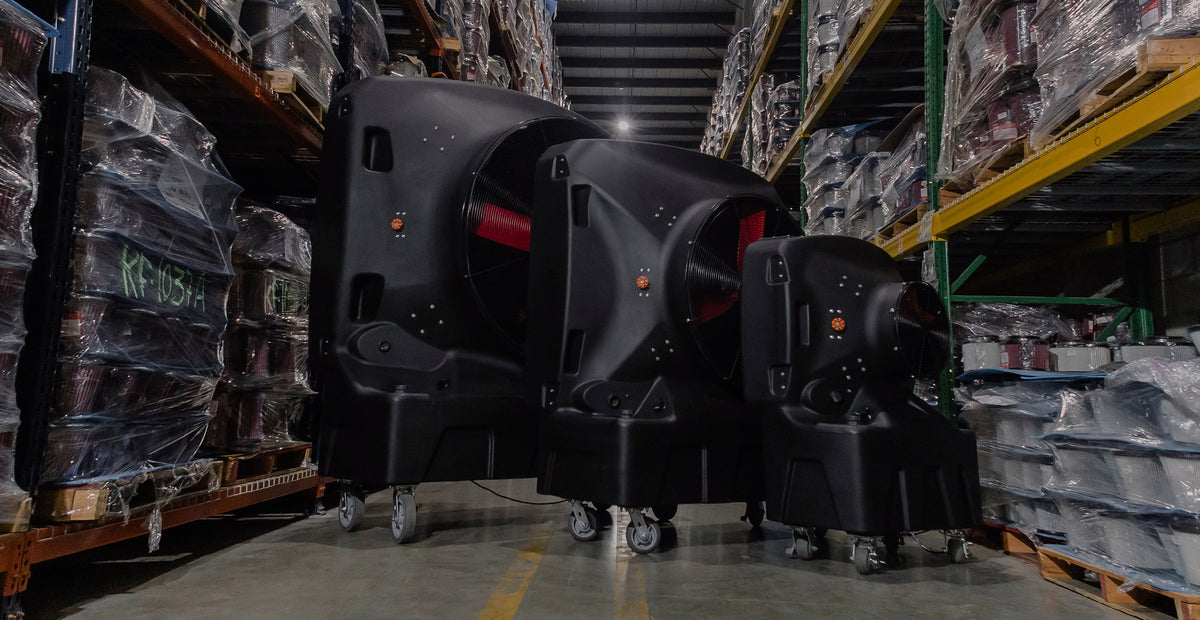 large, medium and small evaporative cooler in a warehouse