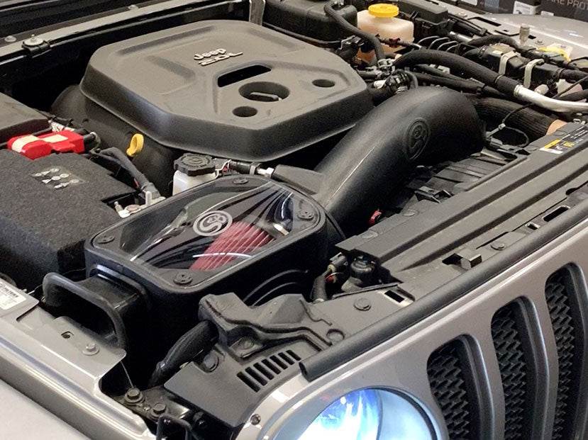Cold Air Intake for 2018-2023 Jeep Wrangler 2.0L Turbo - S&B installed in the engine compartment of a vehicle.
